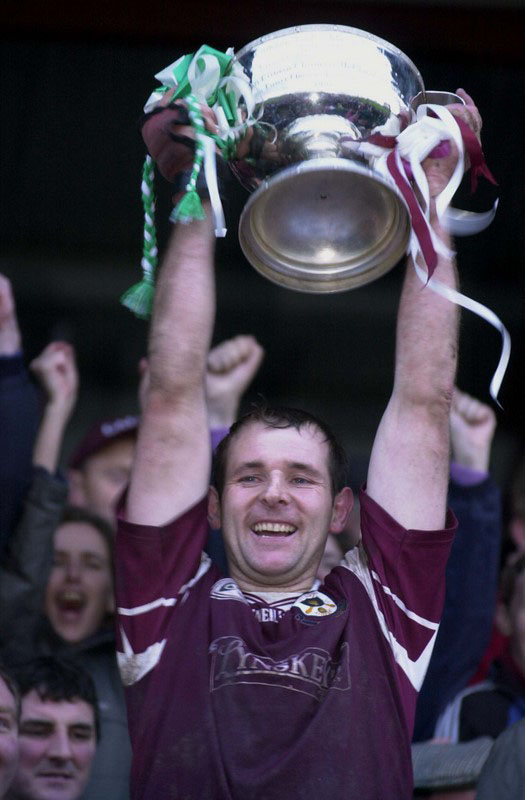 Athenry's Joe Rabbitte holds the championship cup to the cheers after beating Sarsfields in the Final yesterday in Ballinasloe.Picture Ray Ryan